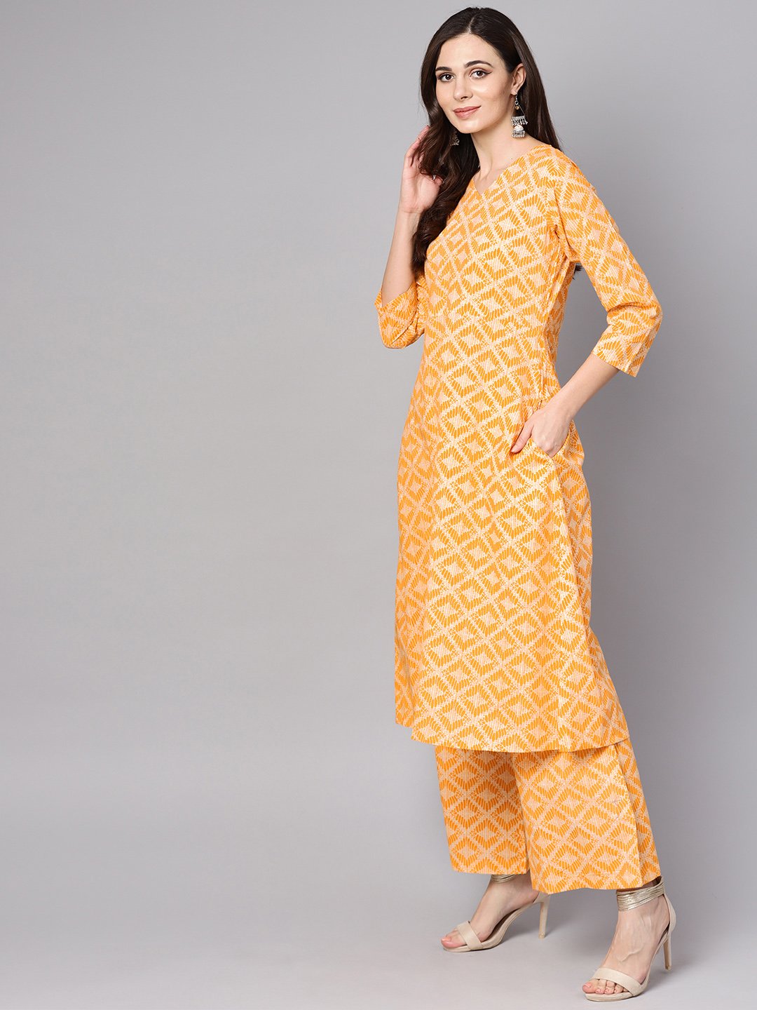 Yellow Geometric Printed Kurta Set With Flared Palazzo | LASVINI - Redefining Indian Fashion with Elegance
