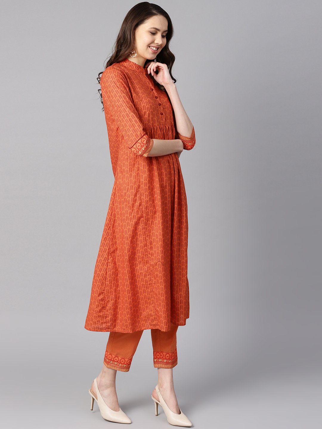 A Line Pleated Kurta With Border Detailing On The Sleeves With Straight Solid Pants | LASVINI - Redefining Indian Fashion with Elegance