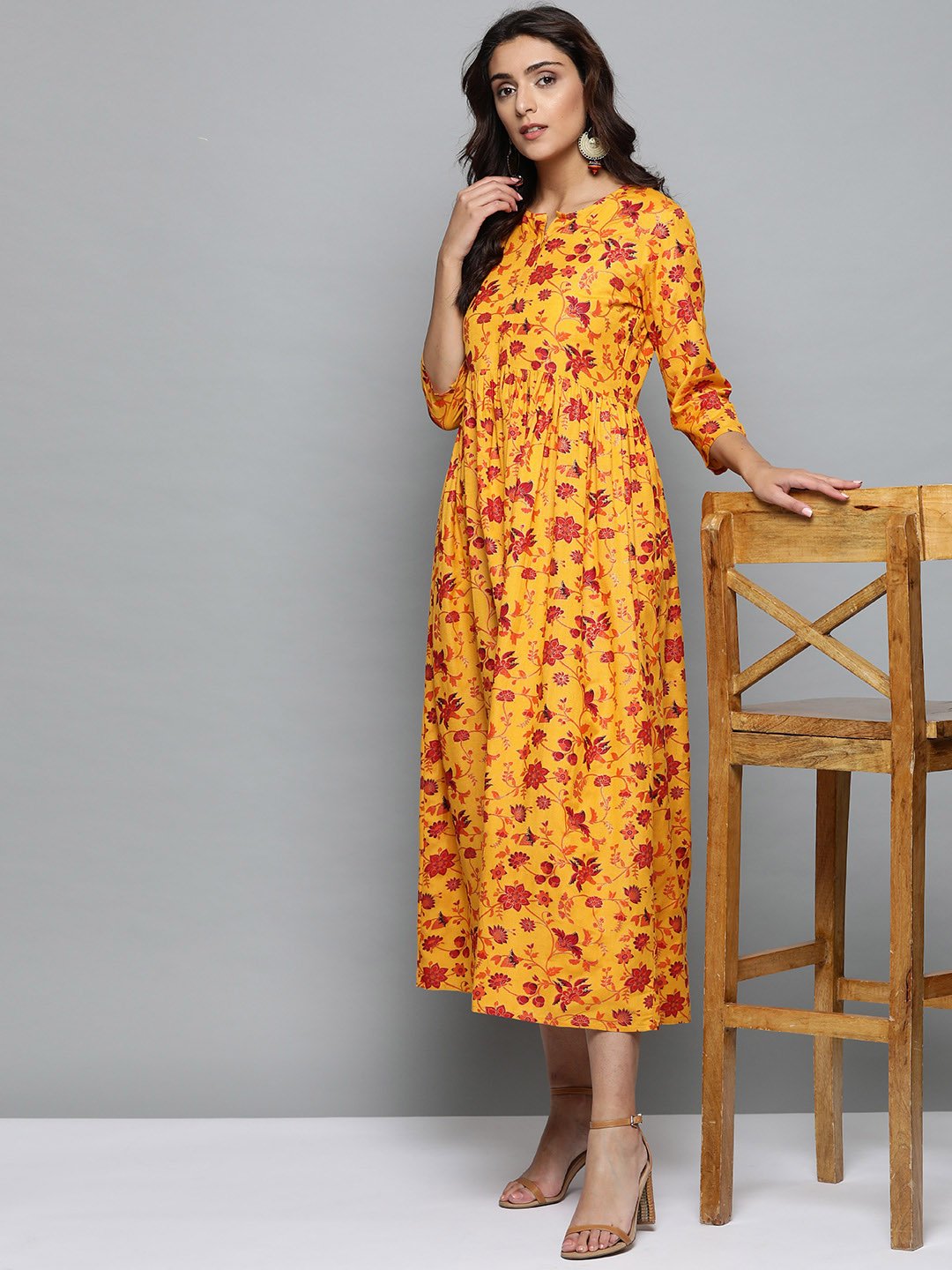 Women Mustard Yellow Floral Printed Round Neck A-Line Dress | LASVINI - Redefining Indian Fashion with Elegance