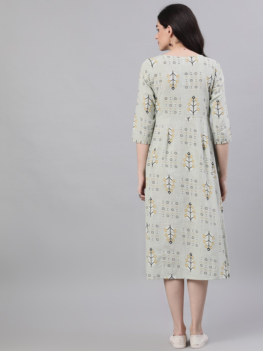 Women Sage Green Floral Printed Boat Neck Cotton A-Line Dress | LASVINI - Redefining Indian Fashion with Elegance