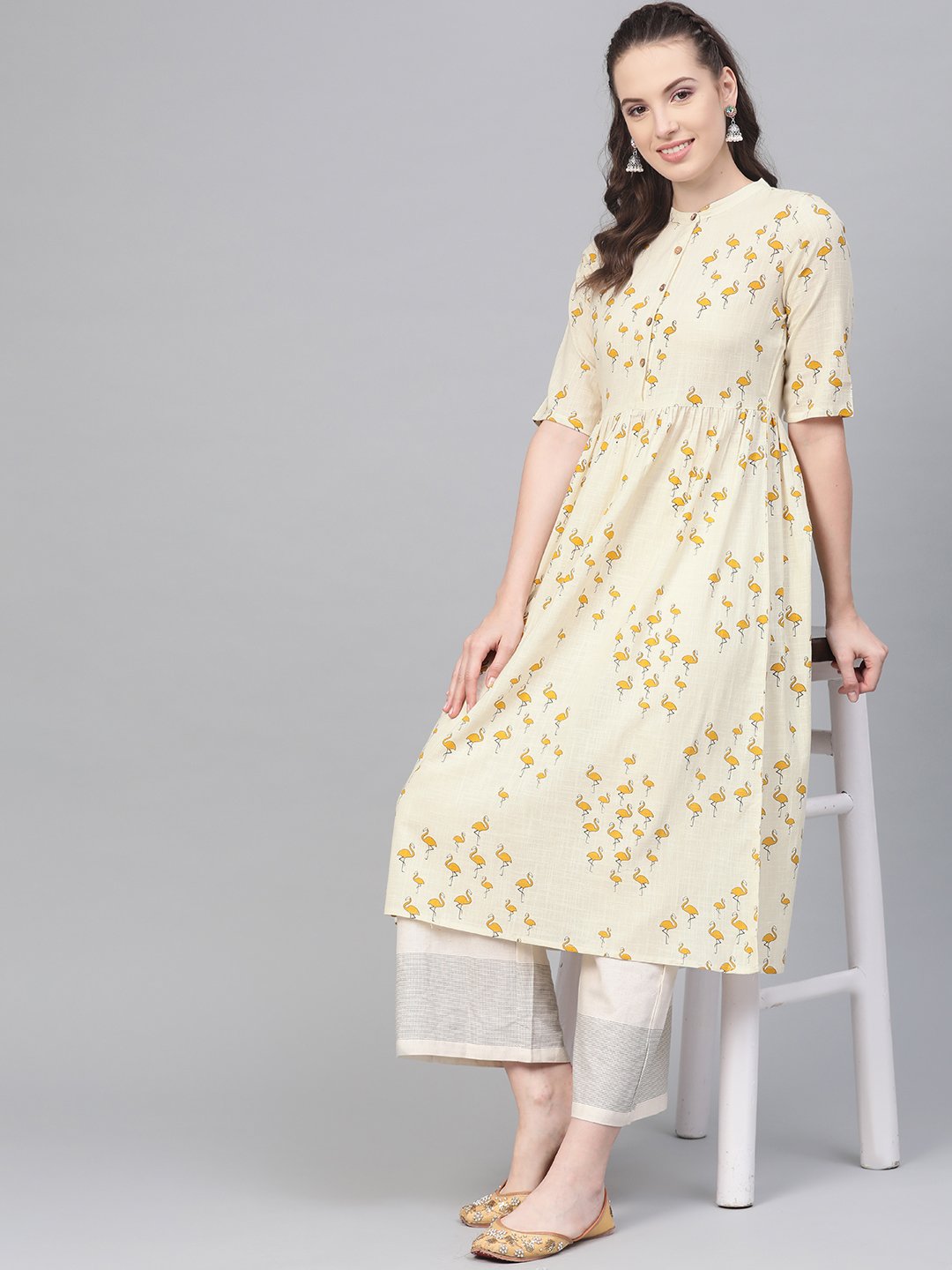 Off White And Yellow Ochre Flamingo Printed Dress With A Detachable Belt Detailing On The Yoke | LASVINI - Redefining Indian Fashion with Elegance