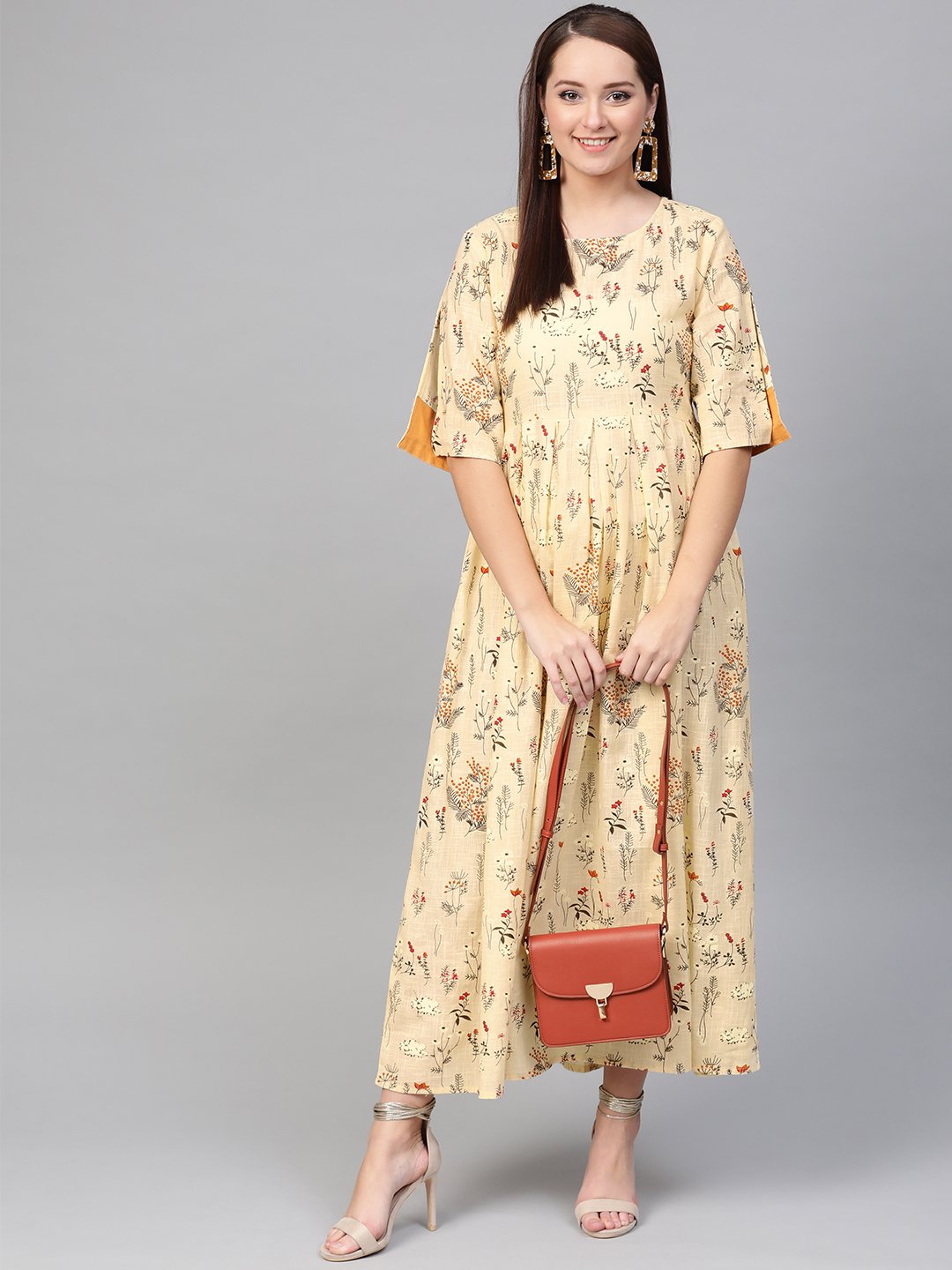 Women Cream & Orange Floral Printed Maxi Dress | LASVINI - Redefining Indian Fashion with Elegance