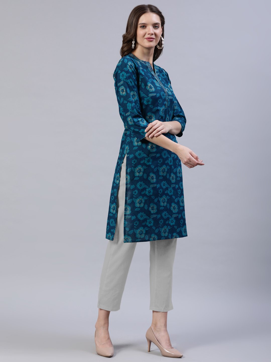 Women Green Straight Kurti With Three Quarter Sleeves | LASVINI - Redefining Indian Fashion with Elegance