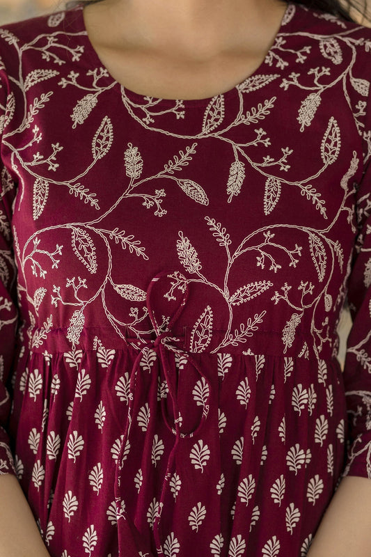 Women Burgundy Ethnic Printed Flared Dress With Three Quarter Sleevs | LASVINI - Redefining Indian Fashion with Elegance