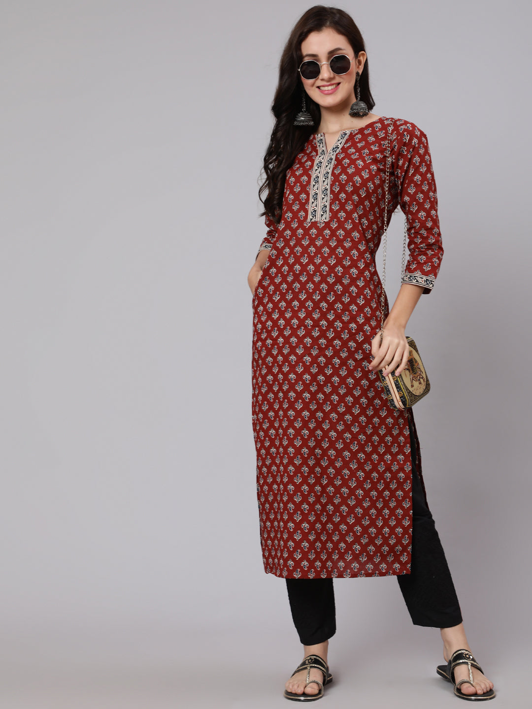 Women Maroon Ethnic Printed Straight Kurta With Three Quarter Sleeves | LASVINI - Redefining Indian Fashion with Elegance