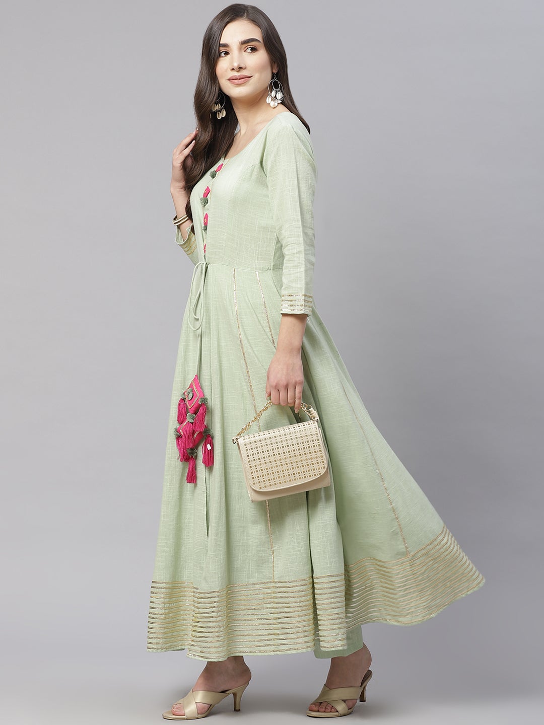 Women'S Pastel Green Flaired Cotton Kurta With Pants | LASVINI - Redefining Indian Fashion with Elegance