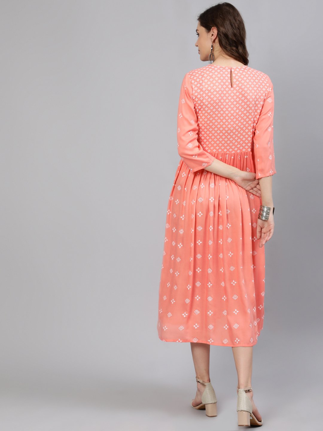 Women Peach Printed Dress With Three Quarter Sleeves | LASVINI - Redefining Indian Fashion with Elegance