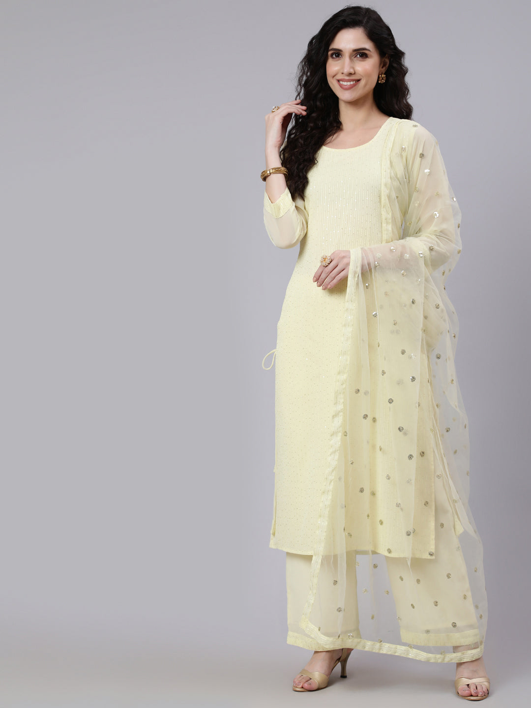 Women Yellow Sequence Georgette Kurta With Palazzo And Net Dupatta | LASVINI - Redefining Indian Fashion with Elegance
