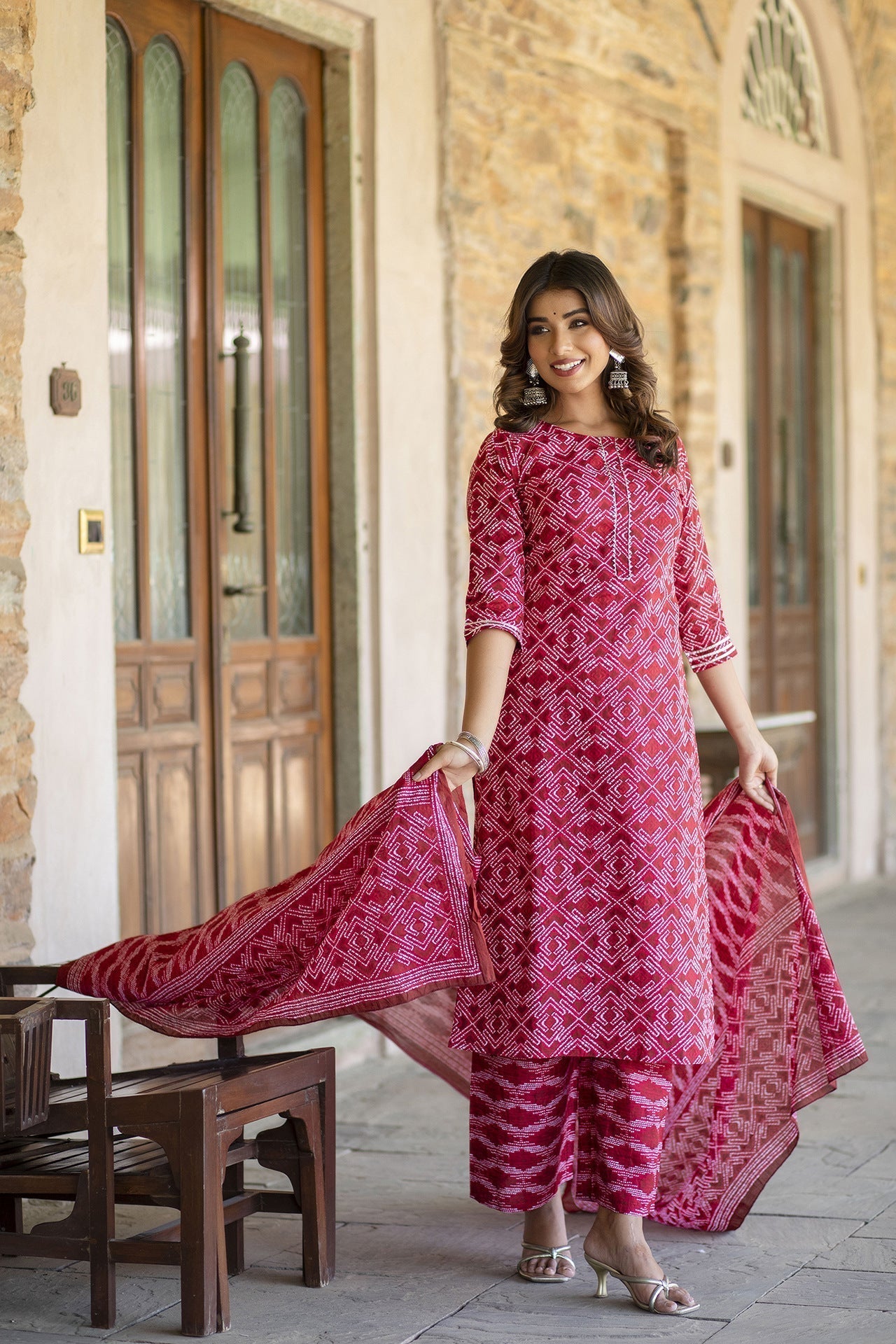 Women Red Bandhani Printed Straight Kurta With Palzzo And Dupatta | LASVINI - Redefining Indian Fashion with Elegance