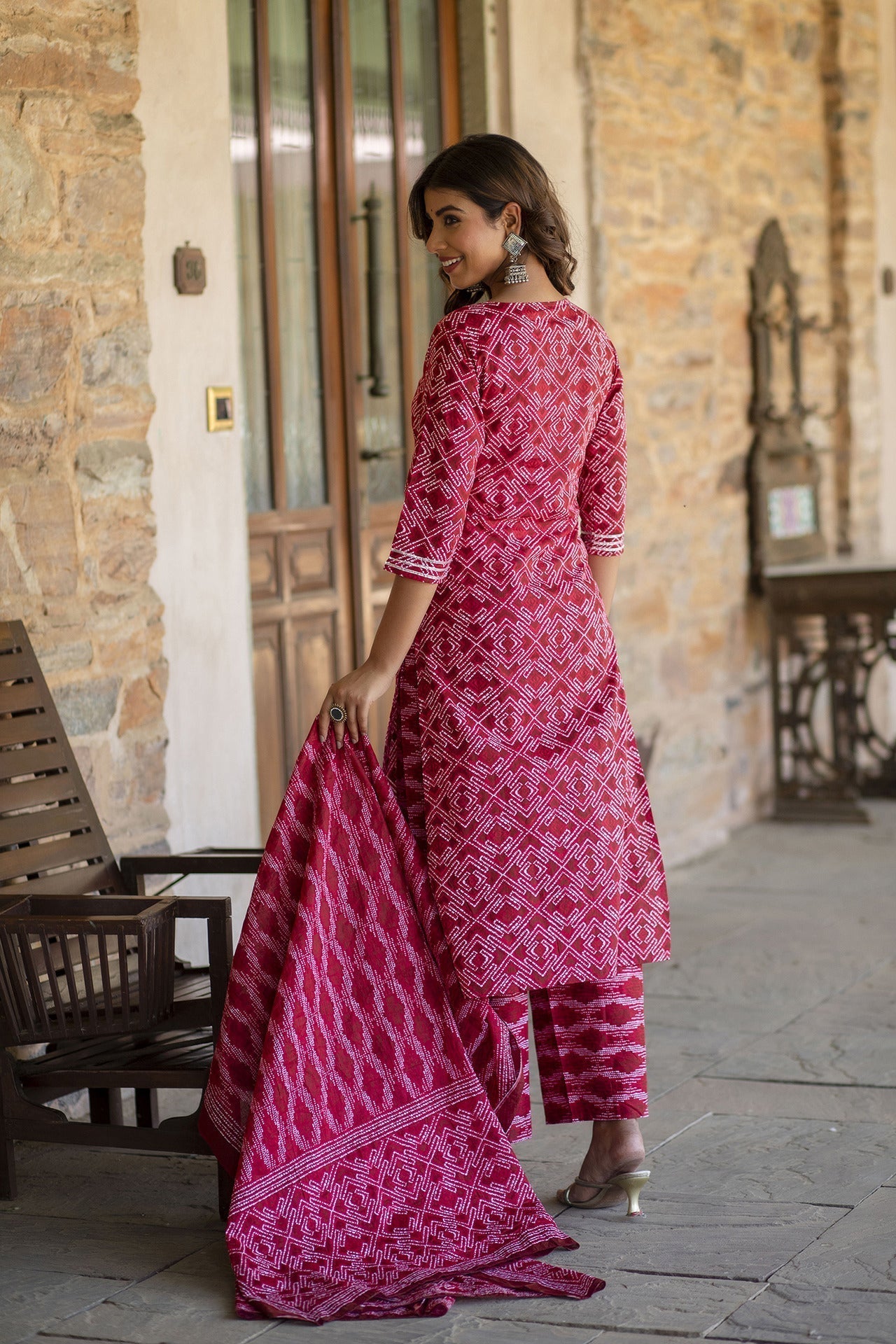Women Red Bandhani Printed Straight Kurta With Palzzo And Dupatta | LASVINI - Redefining Indian Fashion with Elegance