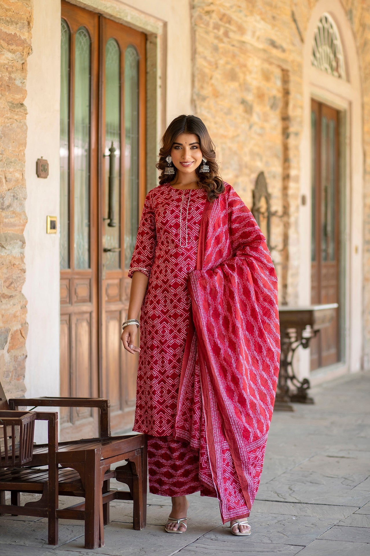 Women Red Bandhani Printed Straight Kurta With Palzzo And Dupatta | LASVINI - Redefining Indian Fashion with Elegance