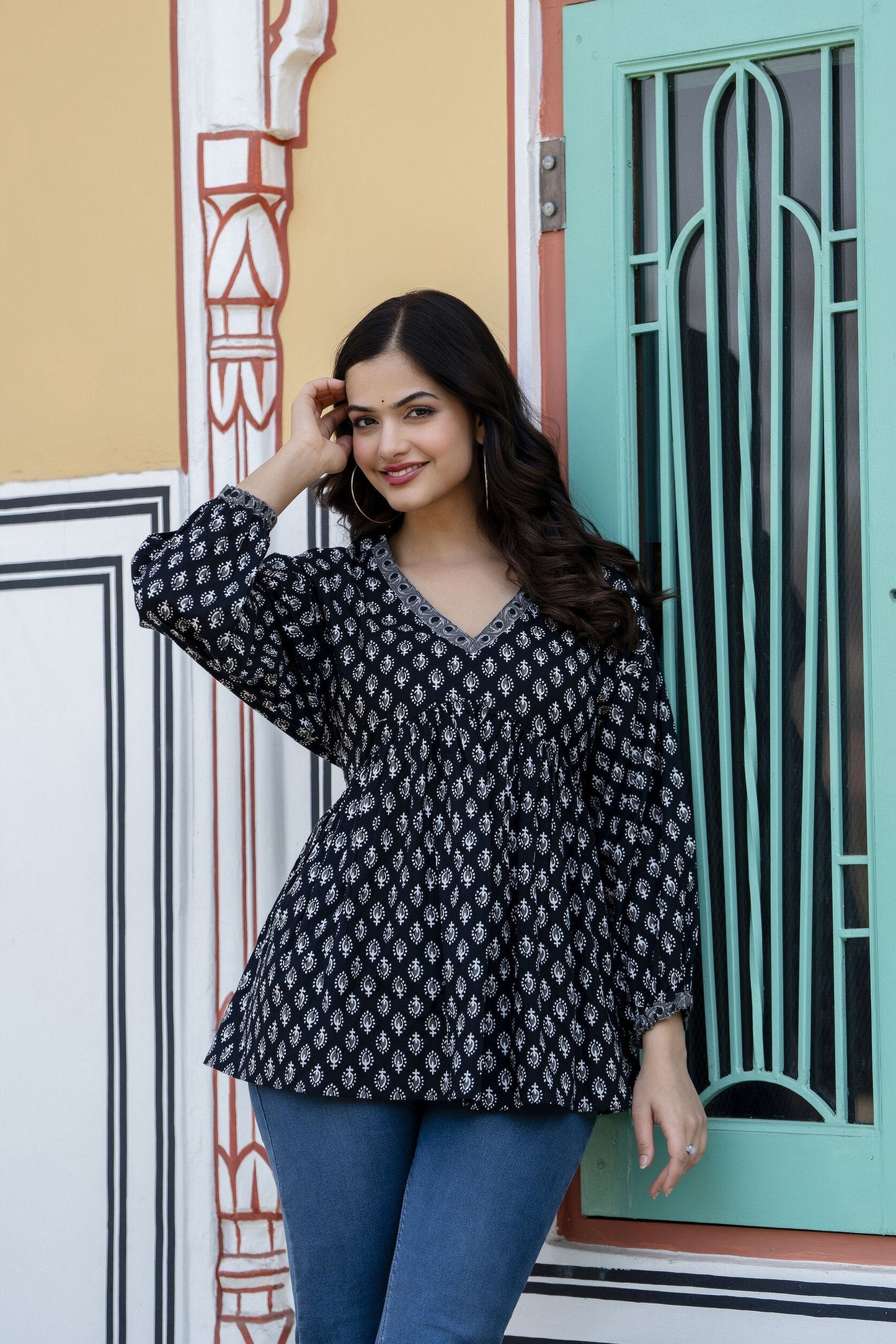 Women Black Printed V-Neck Peplum Tunic | LASVINI - Redefining Indian Fashion with Elegance