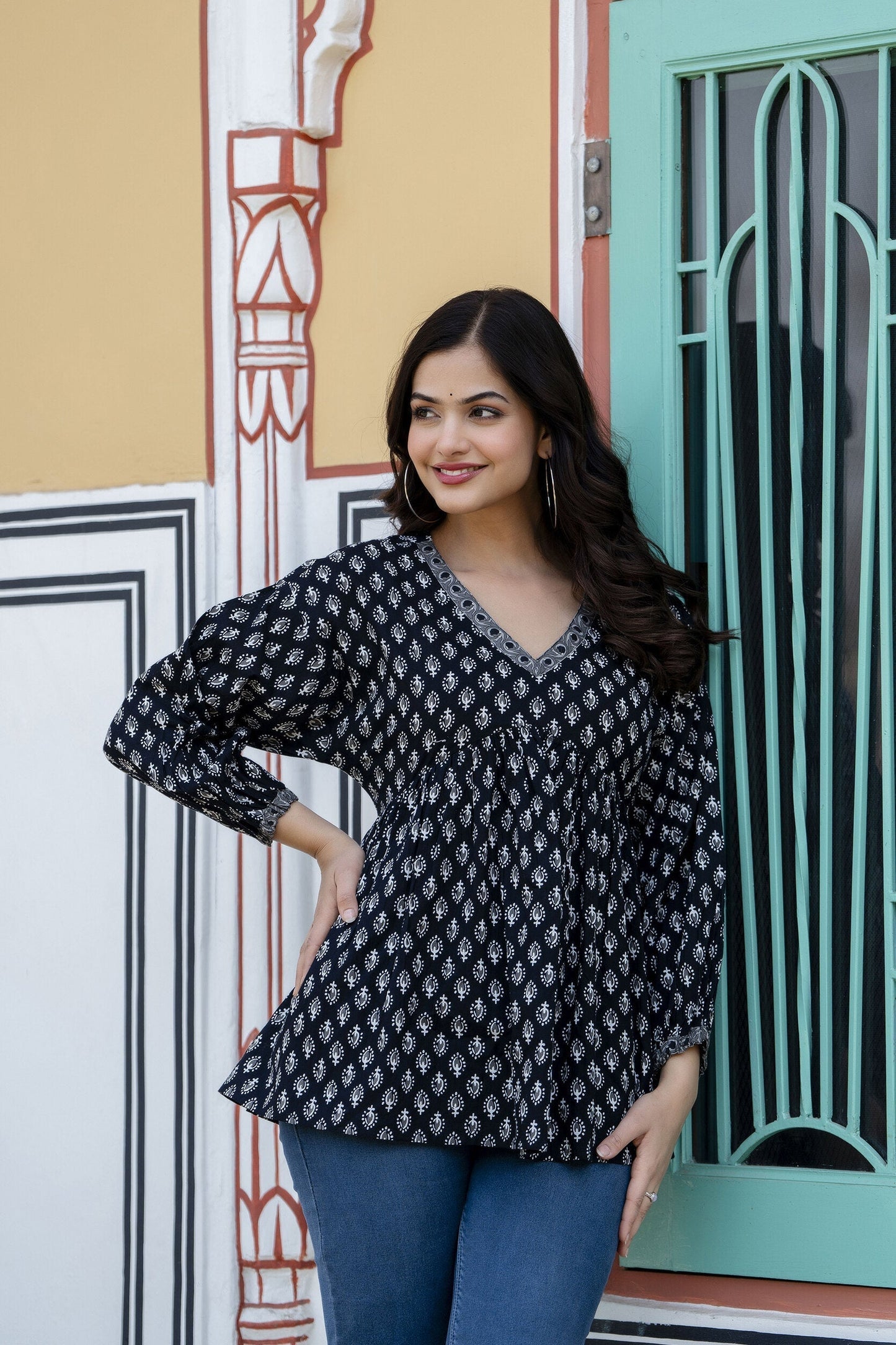 Women Black Printed V-Neck Peplum Tunic | LASVINI - Redefining Indian Fashion with Elegance