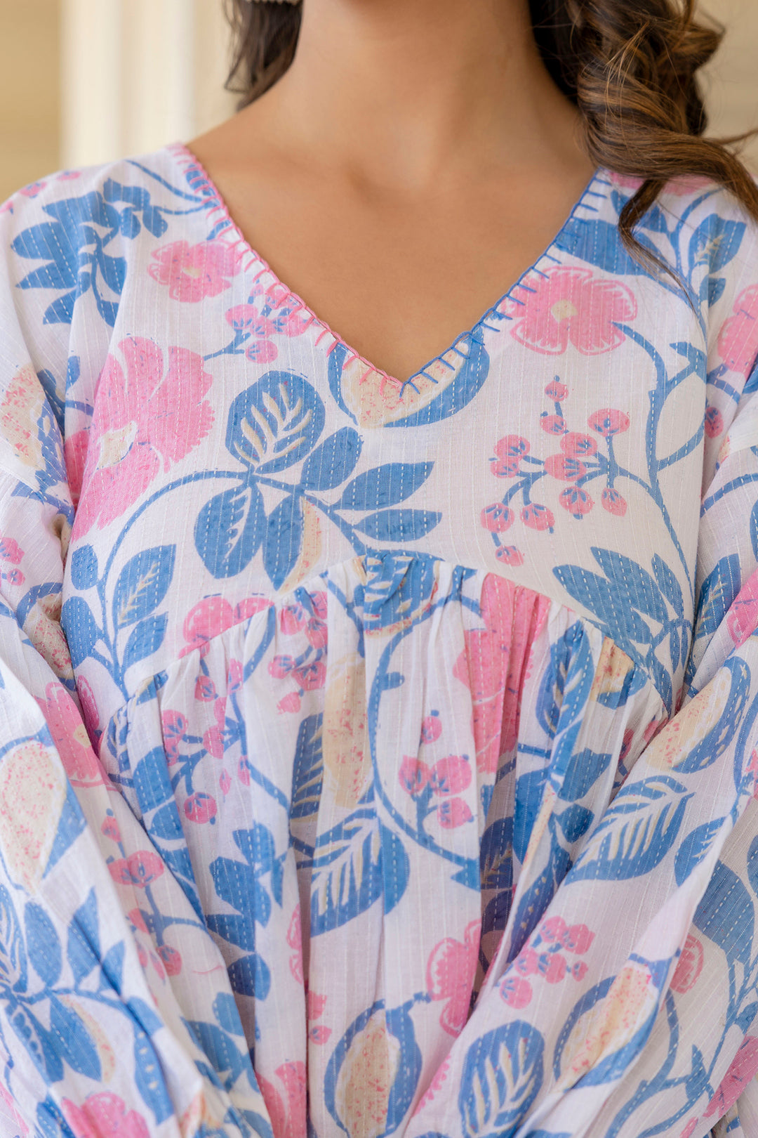 Women White Floral Printed V-Neck Peplum Tunic | LASVINI - Redefining Indian Fashion with Elegance