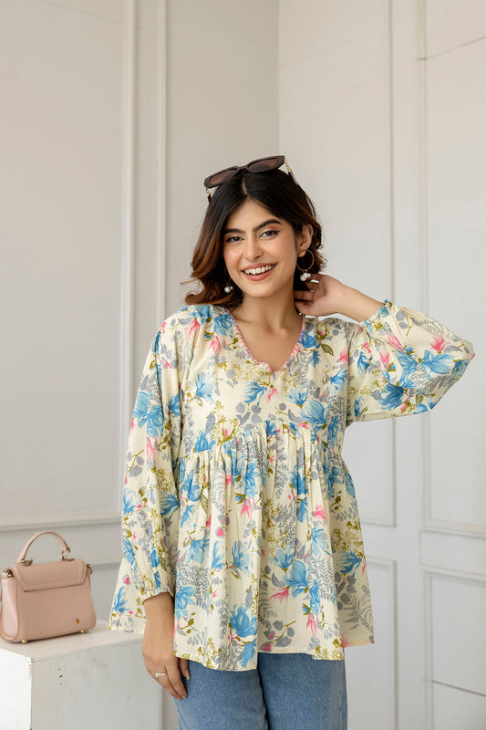 Women Off-White Printed V-Neck Peplum Tunic | LASVINI - Redefining Indian Fashion with Elegance