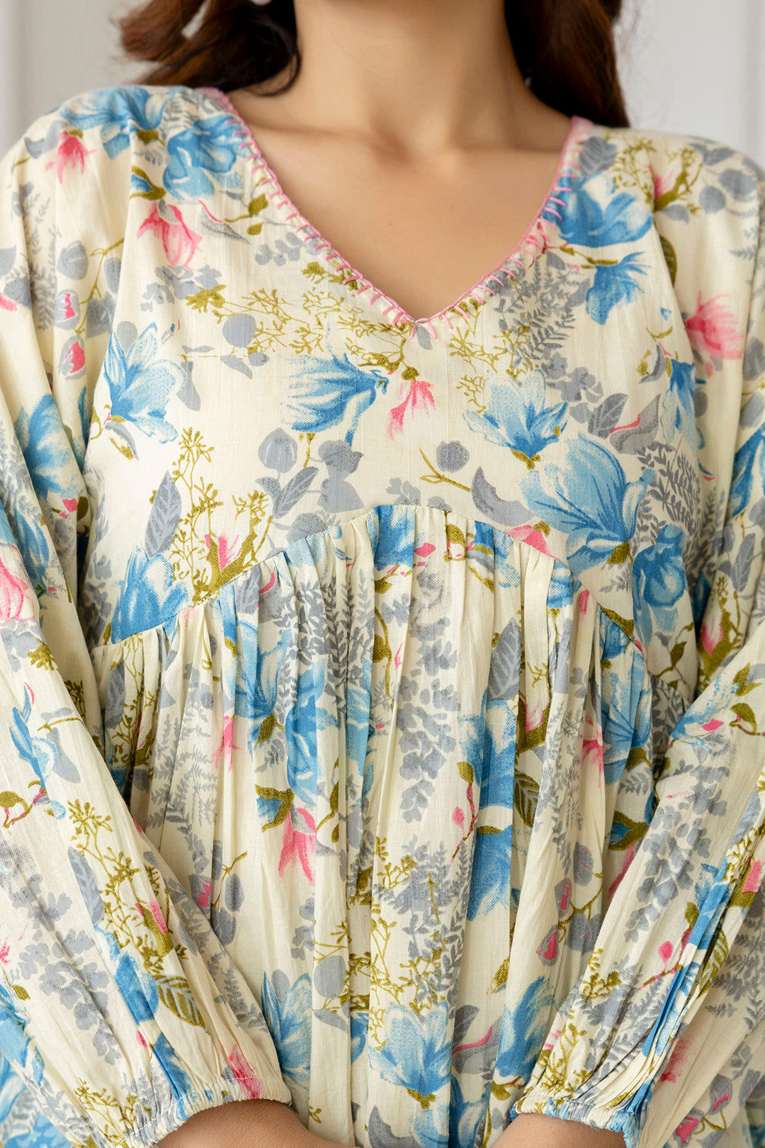 Women Off-White Printed V-Neck Peplum Tunic | LASVINI - Redefining Indian Fashion with Elegance
