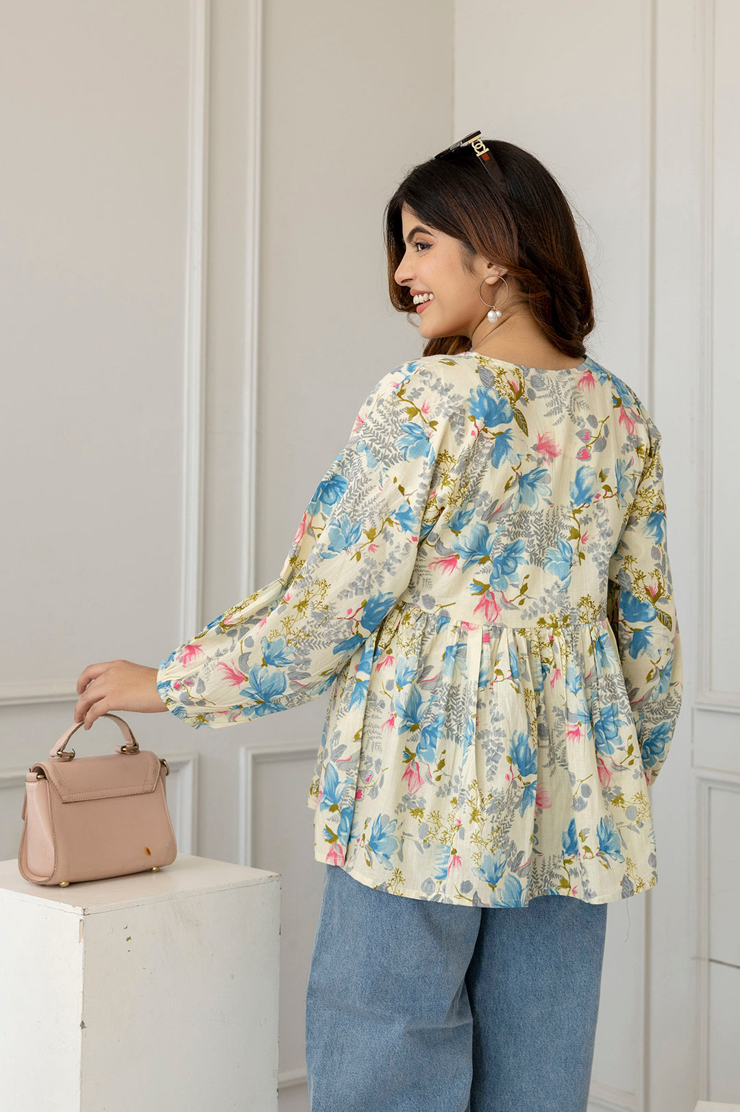 Women Off-White Printed V-Neck Peplum Tunic | LASVINI - Redefining Indian Fashion with Elegance