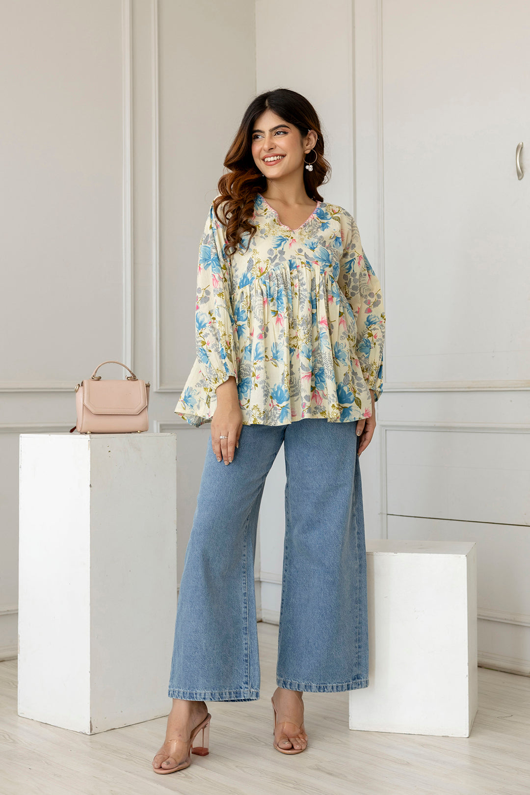 Women Off-White Printed V-Neck Peplum Tunic | LASVINI - Redefining Indian Fashion with Elegance