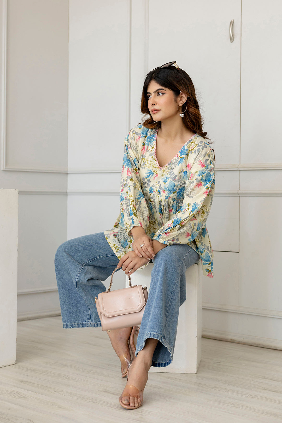 Women Off-White Printed V-Neck Peplum Tunic | LASVINI - Redefining Indian Fashion with Elegance