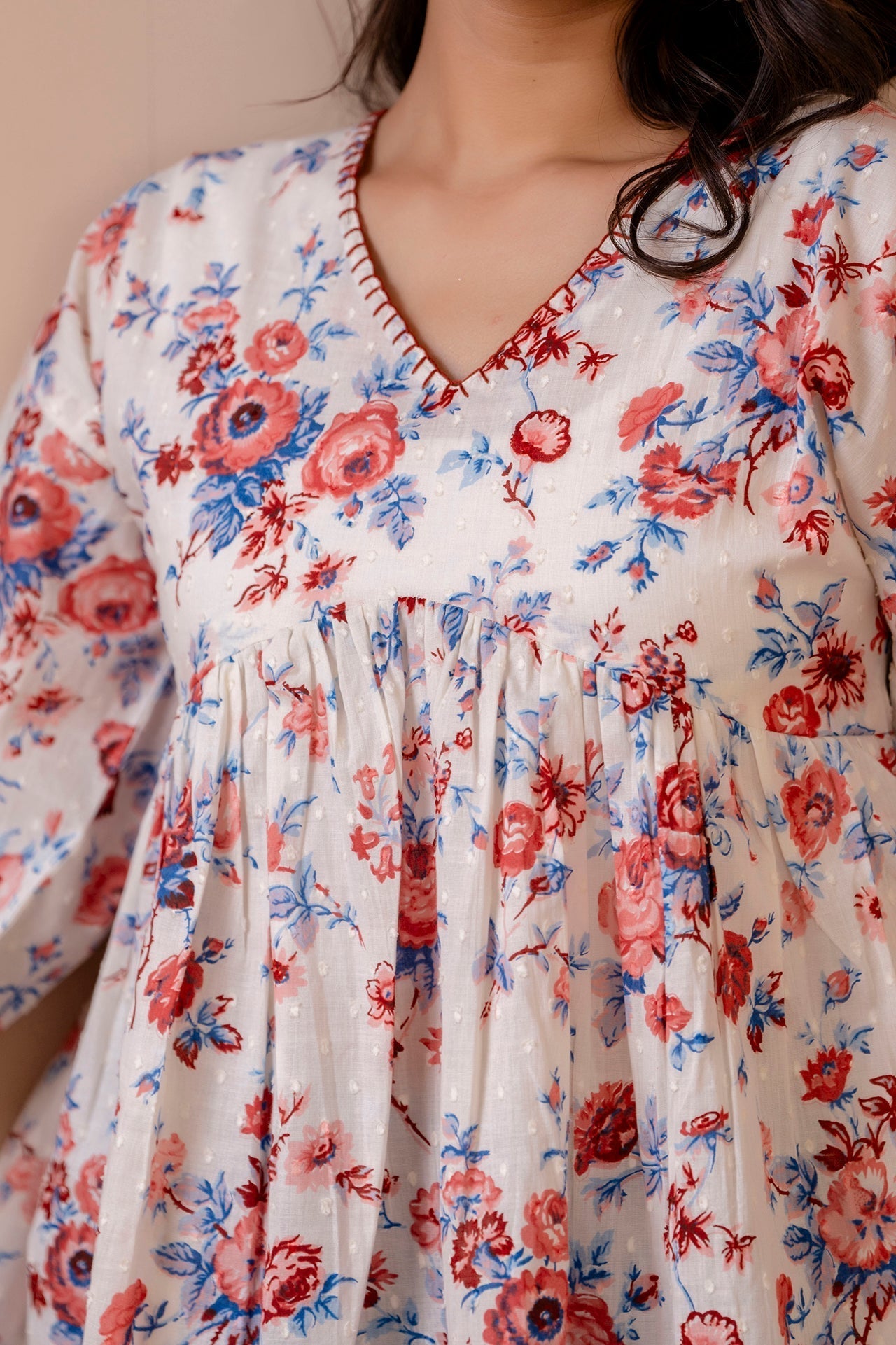 Women White Floral Printed V-Neck Peplum Tunic | LASVINI - Redefining Indian Fashion with Elegance