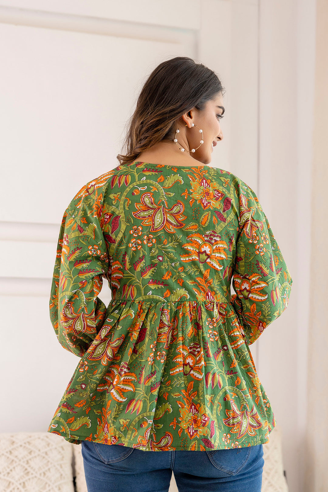 Women Green Printed V-Neck Peplum Tunic | LASVINI - Redefining Indian Fashion with Elegance