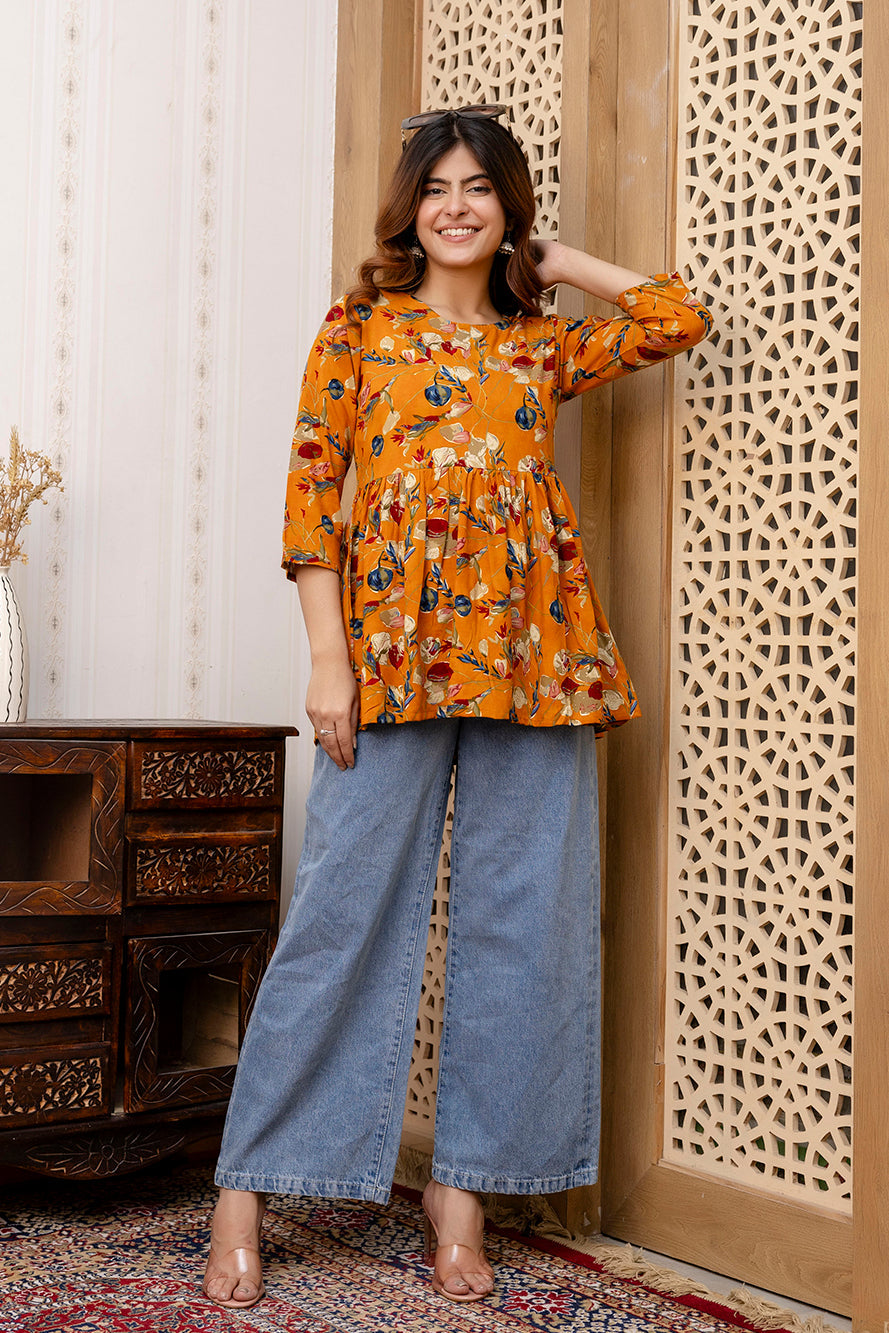Women Mustard Printed V-Neck Peplum Tunic | LASVINI - Redefining Indian Fashion with Elegance