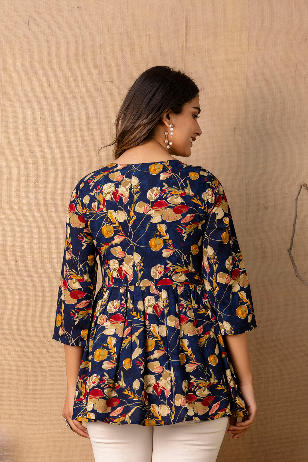 Women Navy Blue Printed V-Neck Peplum Tunic | LASVINI - Redefining Indian Fashion with Elegance