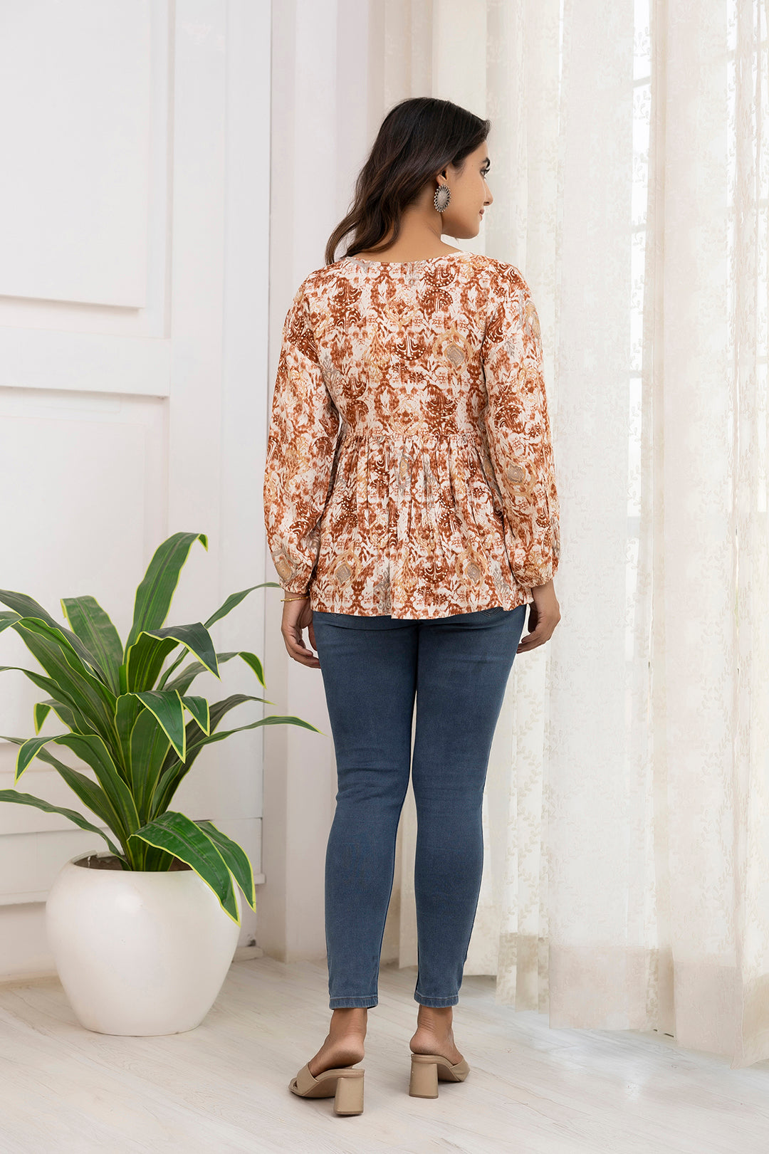 Women Rust Printed Peplum Tunic | LASVINI - Redefining Indian Fashion with Elegance