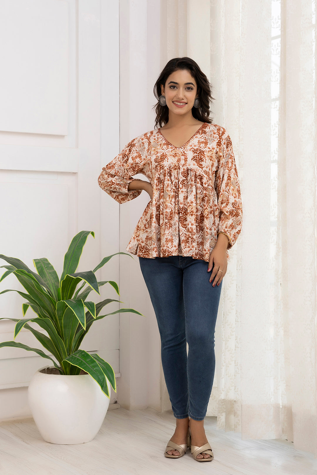 Women Rust Printed Peplum Tunic | LASVINI - Redefining Indian Fashion with Elegance