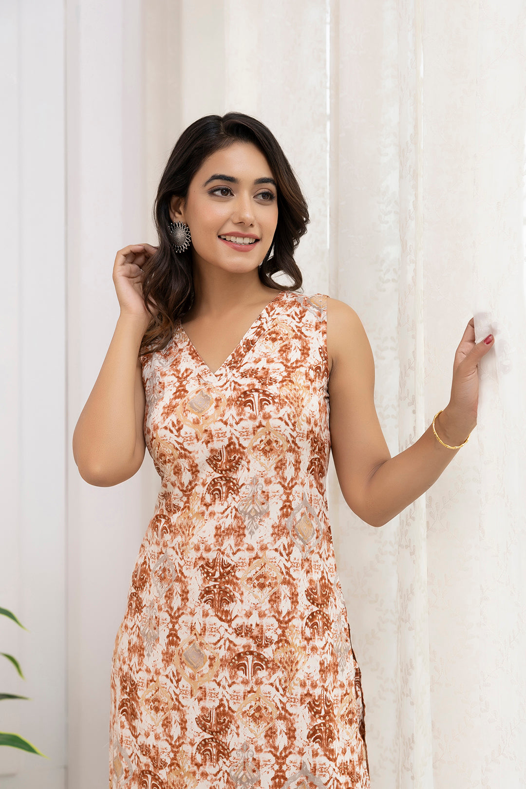 Women Rust And Off White Printed Straight Kurta With Trouser | LASVINI - Redefining Indian Fashion with Elegance