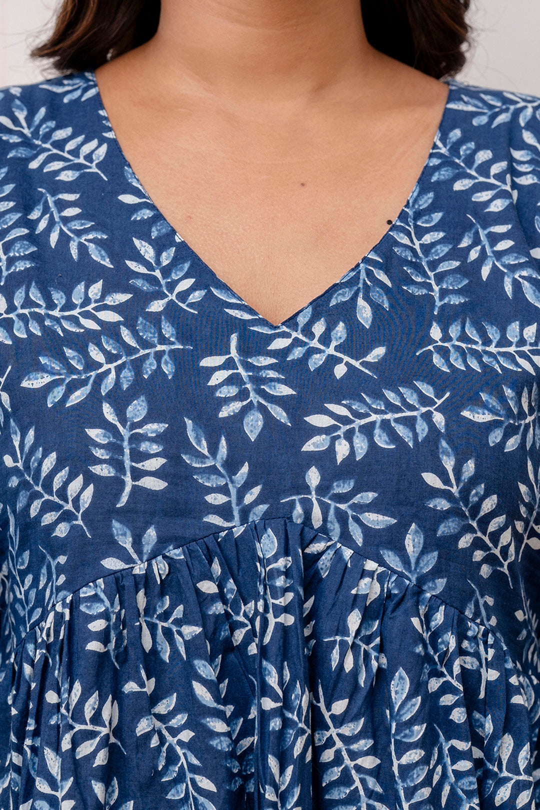 Women Navy Blue Printed V-Neck Peplum Tunic | LASVINI - Redefining Indian Fashion with Elegance