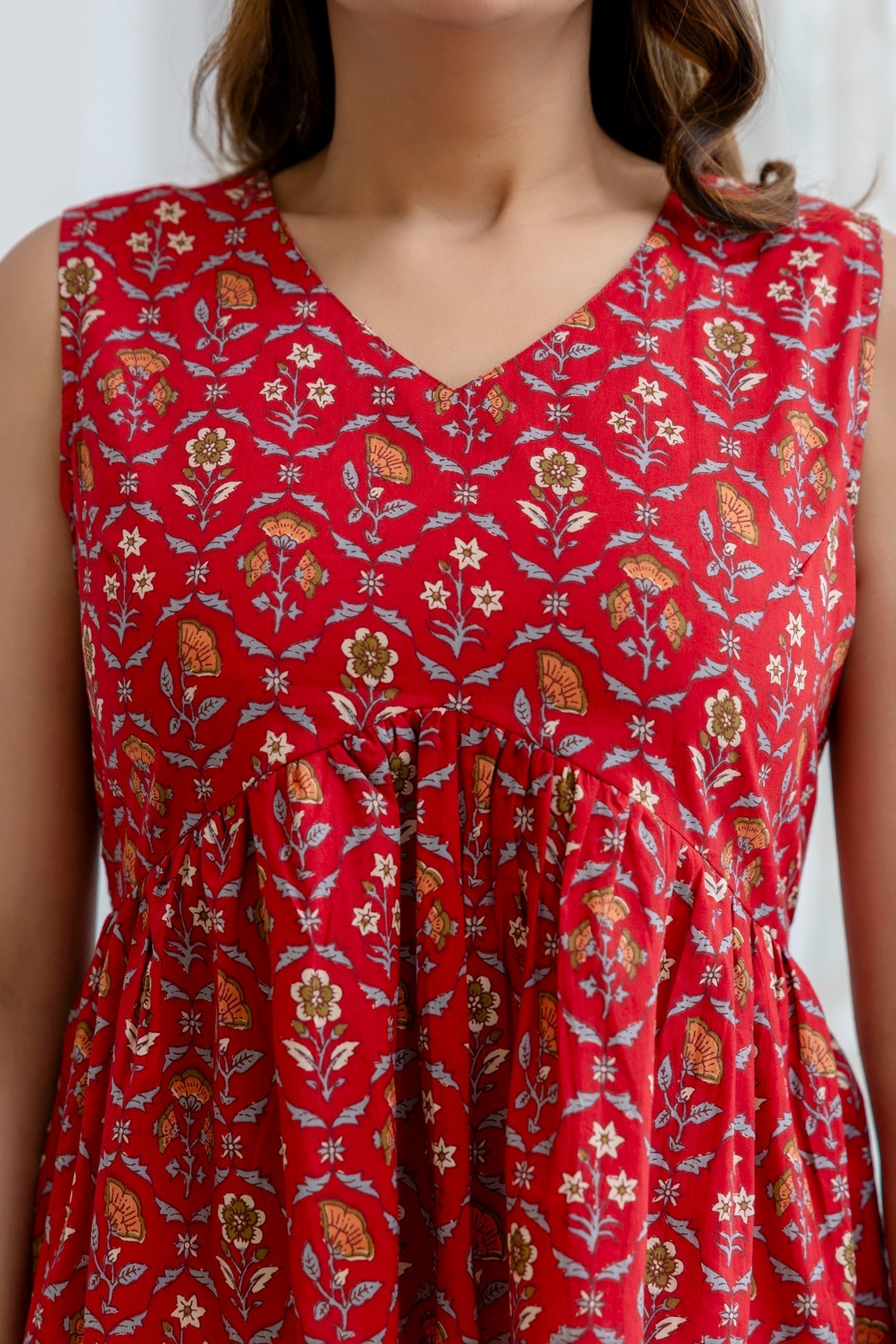 Women Red Printed Peplum Tunic | LASVINI - Redefining Indian Fashion with Elegance