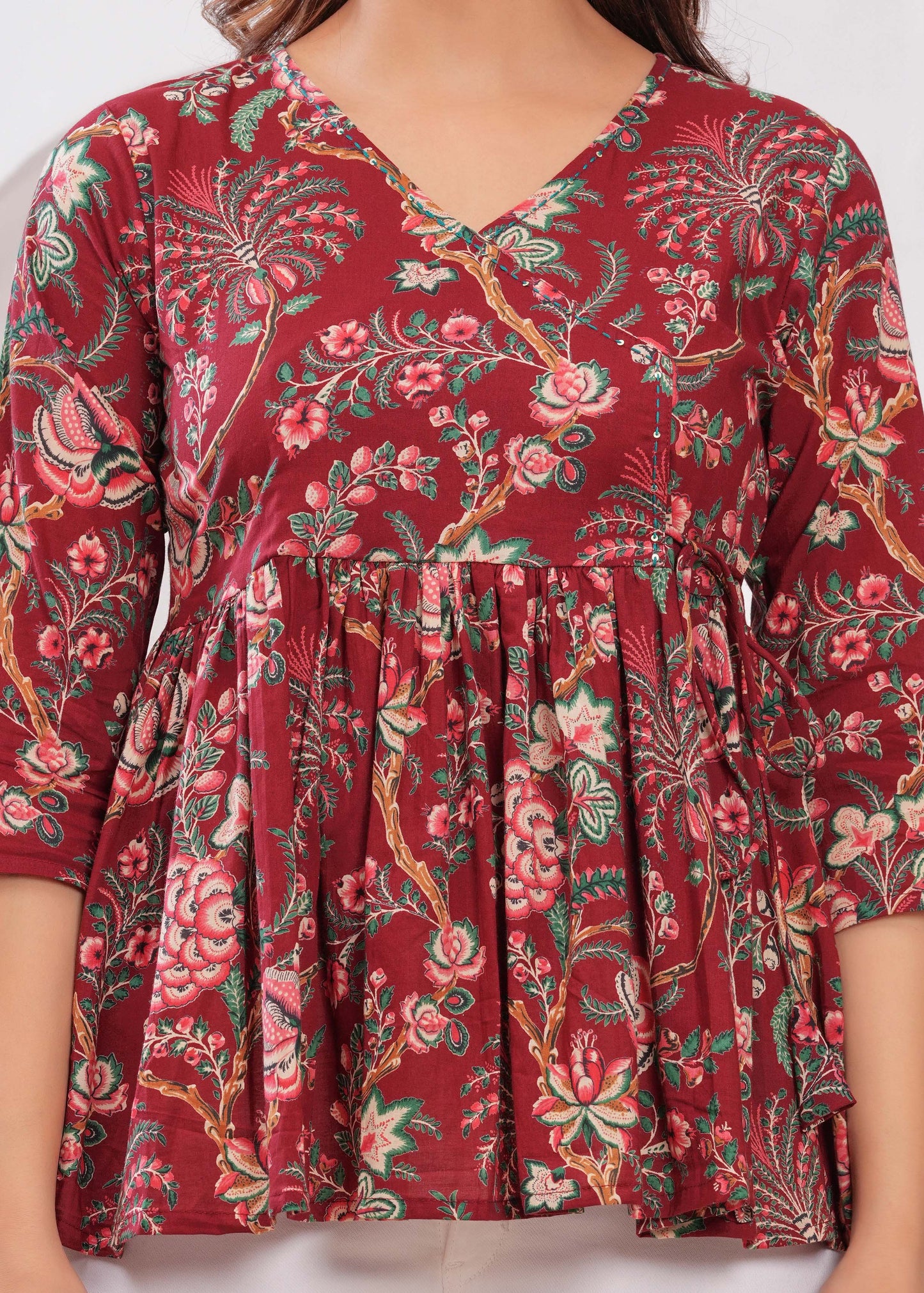 Women Maroon Printed Peplum Tunic | LASVINI - Redefining Indian Fashion with Elegance