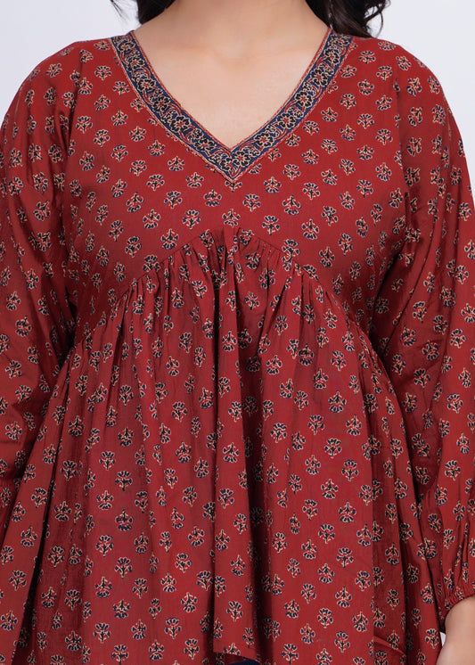 Women Maroon Printed Peplum Tunic | LASVINI - Redefining Indian Fashion with Elegance