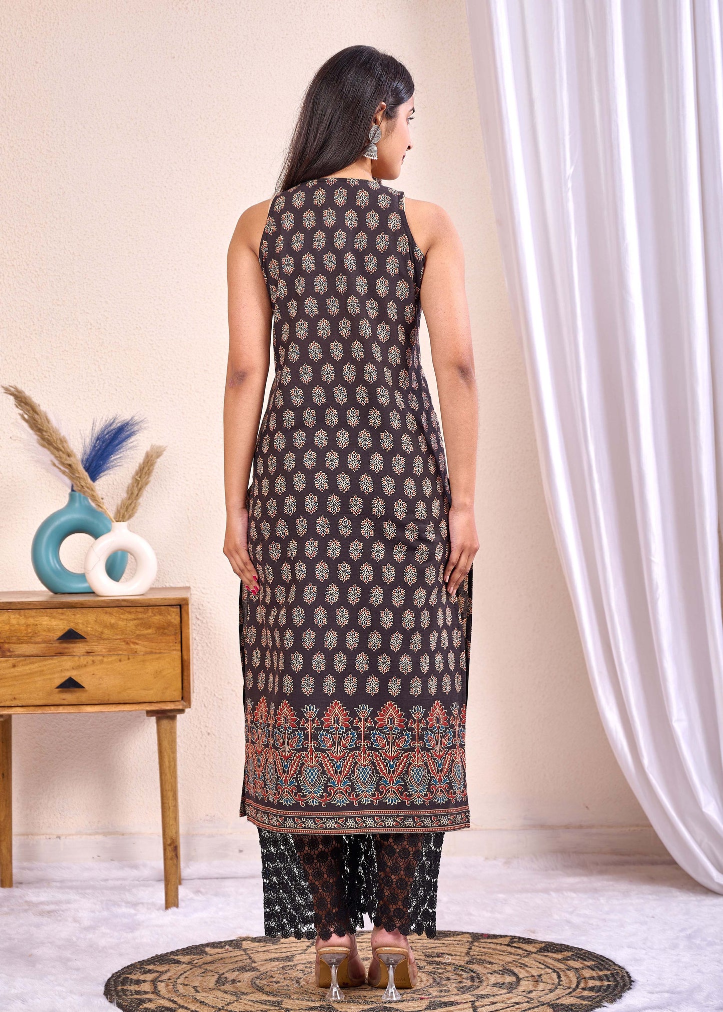 Women Black Printed Straight Sleeveless Kurta | LASVINI - Redefining Indian Fashion with Elegance