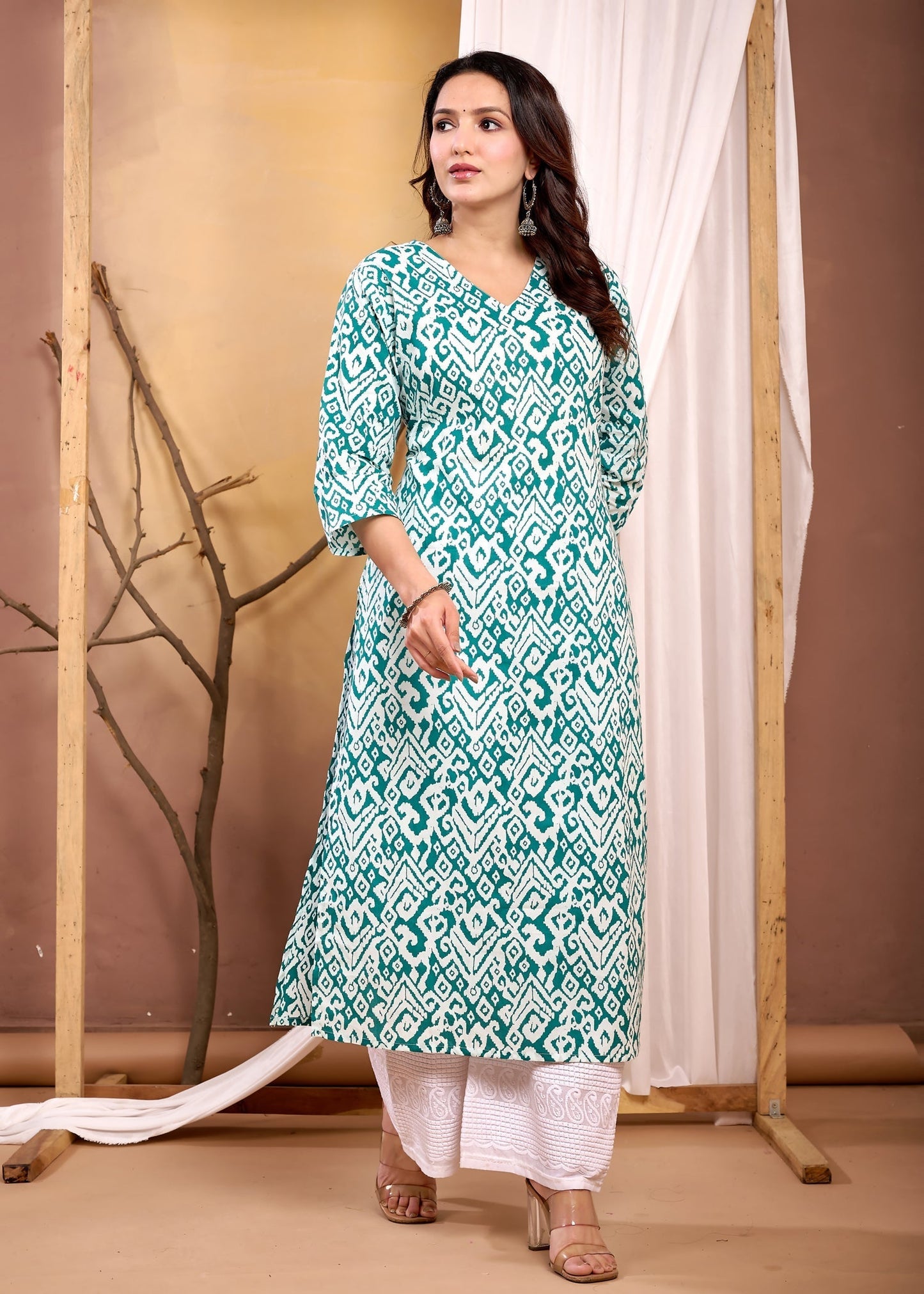Turquoise Blue Printed Straight Kurta with Three Quarter Sleeves | LASVINI - Redefining Indian Fashion with Elegance