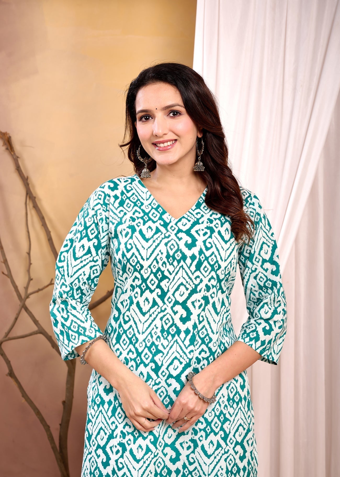Turquoise Blue Printed Straight Kurta with Three Quarter Sleeves | LASVINI - Redefining Indian Fashion with Elegance