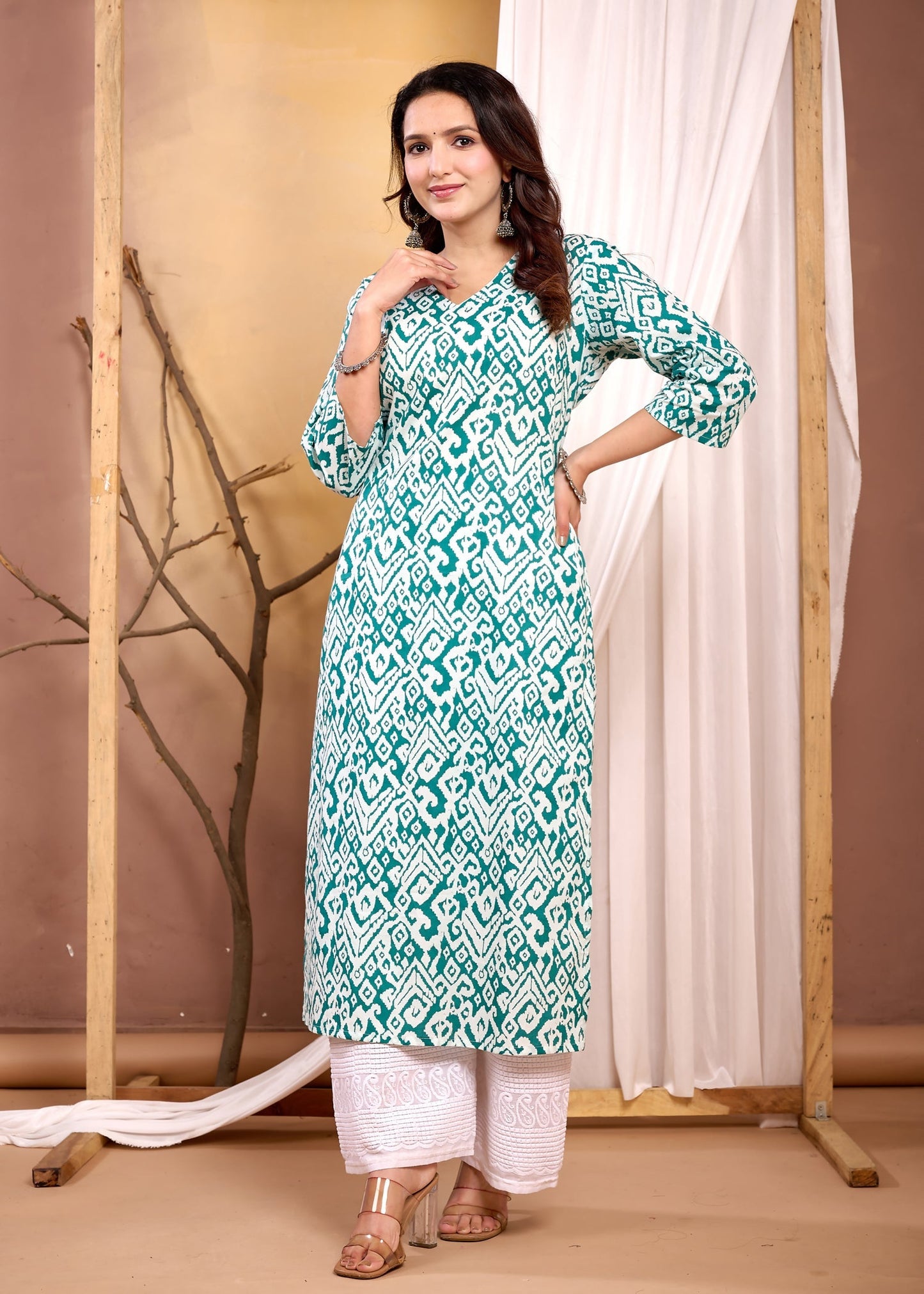 Turquoise Blue Printed Straight Kurta with Three Quarter Sleeves | LASVINI - Redefining Indian Fashion with Elegance