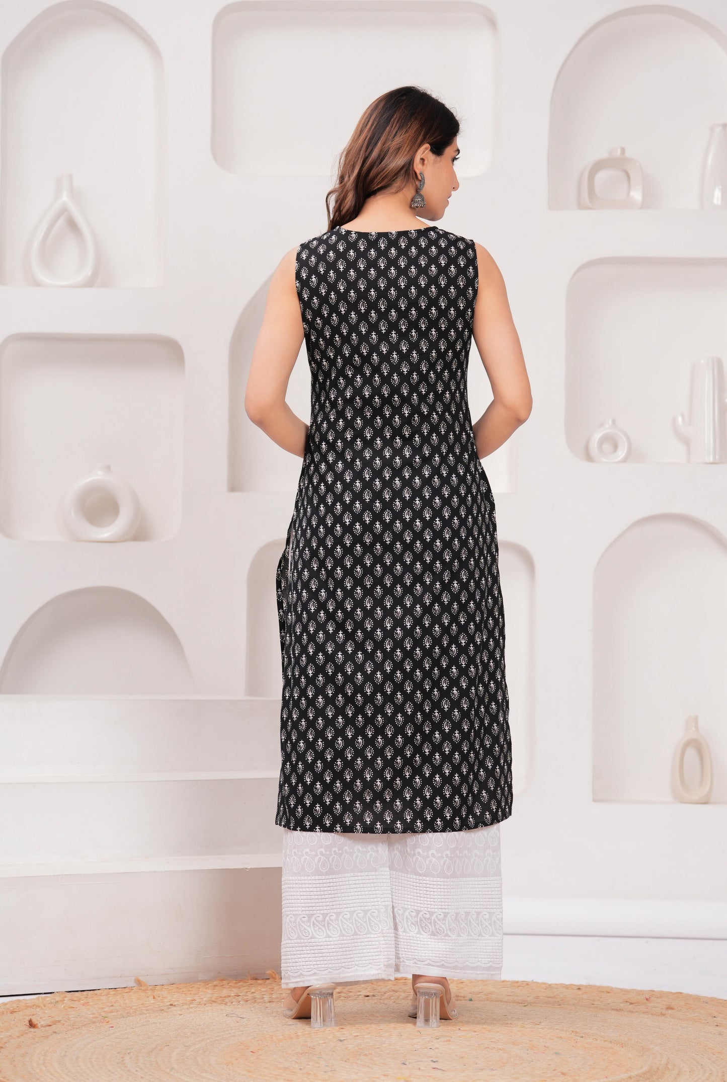 Women Black Printed Straight Sleeveless Kurta | LASVINI - Redefining Indian Fashion with Elegance