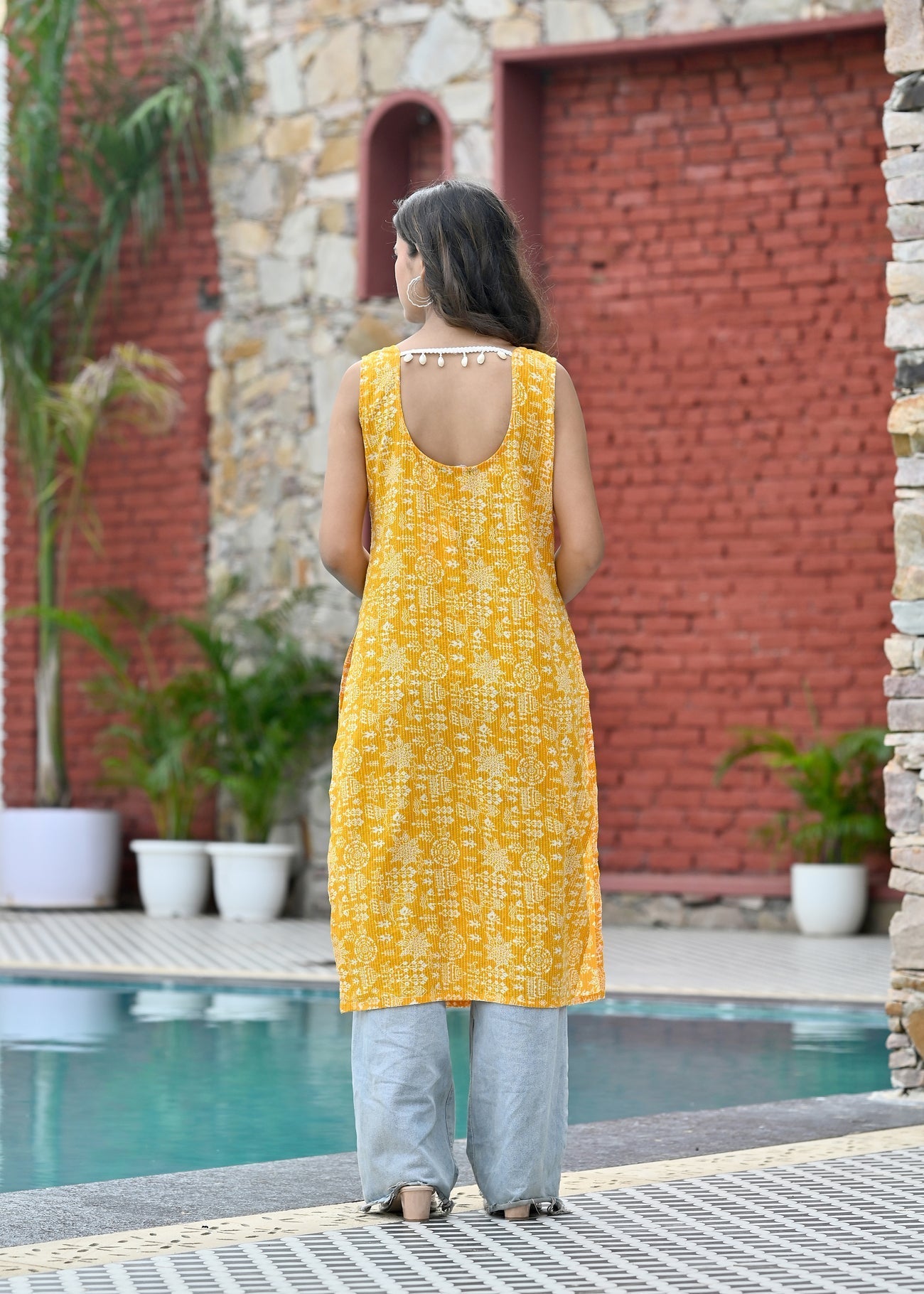 Women Yellow Printed Straight Sleeveless Kurta | LASVINI - Redefining Indian Fashion with Elegance