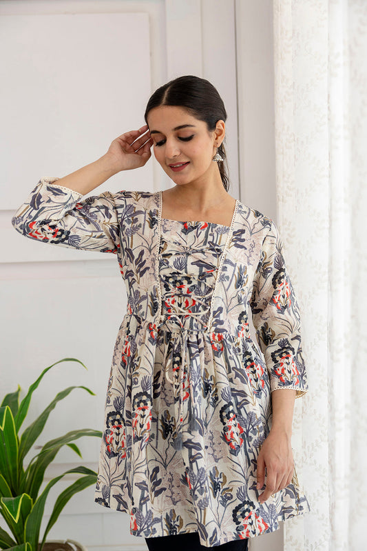 Women Off-White Printed V-Neck Peplum Tunic | LASVINI - Redefining Indian Fashion with Elegance