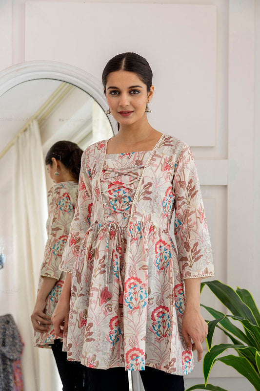 Women Off-White Printed V-Neck Peplum Tunic | LASVINI - Redefining Indian Fashion with Elegance