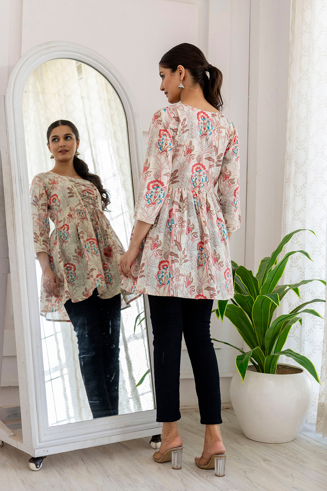 Women Off-White Printed V-Neck Peplum Tunic | LASVINI - Redefining Indian Fashion with Elegance
