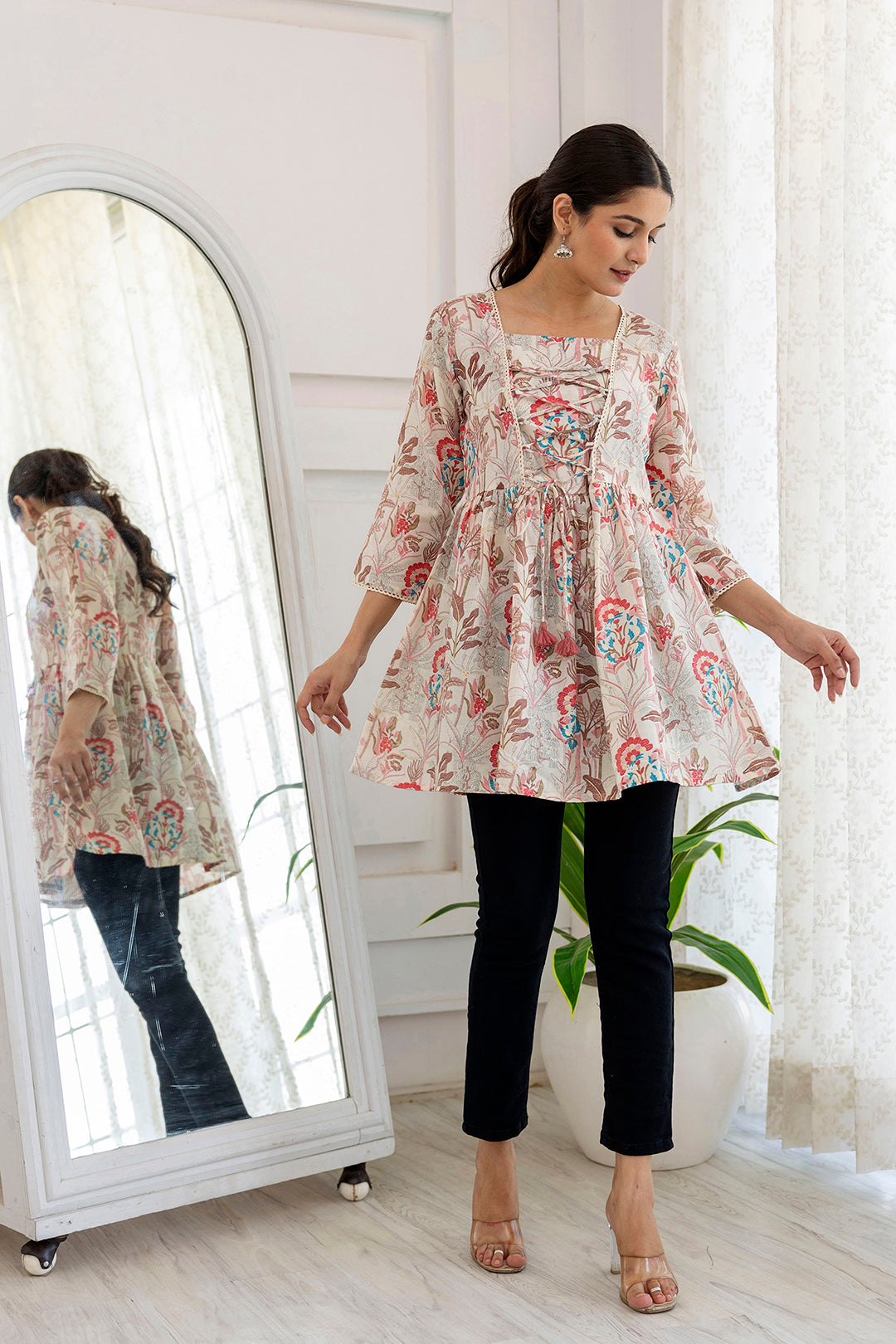 Women Off-White Printed V-Neck Peplum Tunic | LASVINI - Redefining Indian Fashion with Elegance