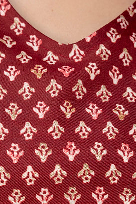 Women Maroon Printed V-Neck Peplum Tunic | LASVINI - Redefining Indian Fashion with Elegance