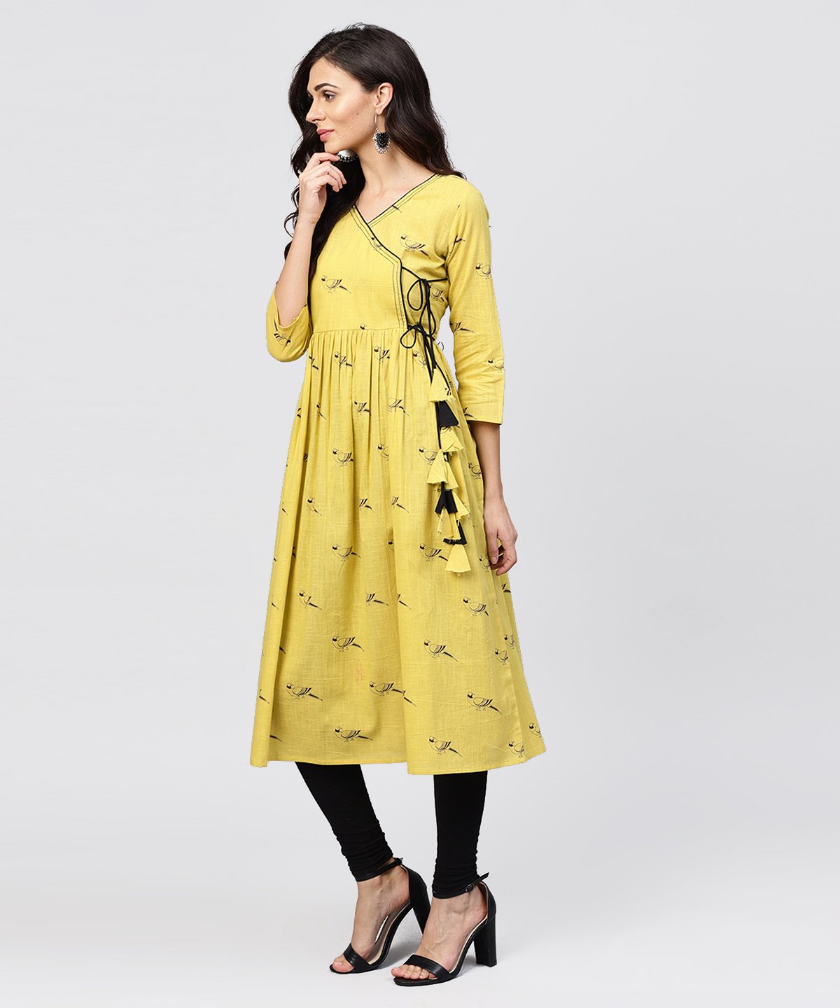 Cotton Mustard Pleated Angrakha With V-Neck And Embellished With Tassel | LASVINI - Redefining Indian Fashion with Elegance