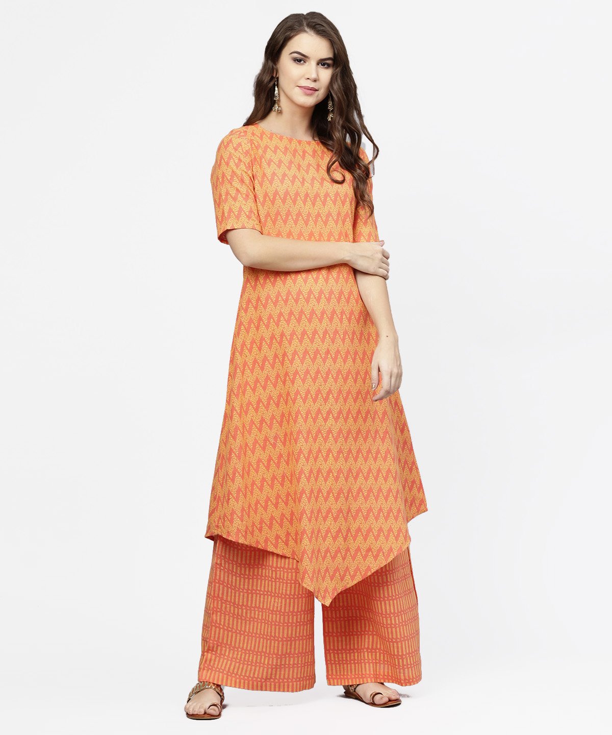Yellow & Peach Printed Half Sleeve Cotton Assymetric Kurta With Ankle Length Palazzo | LASVINI - Redefining Indian Fashion with Elegance