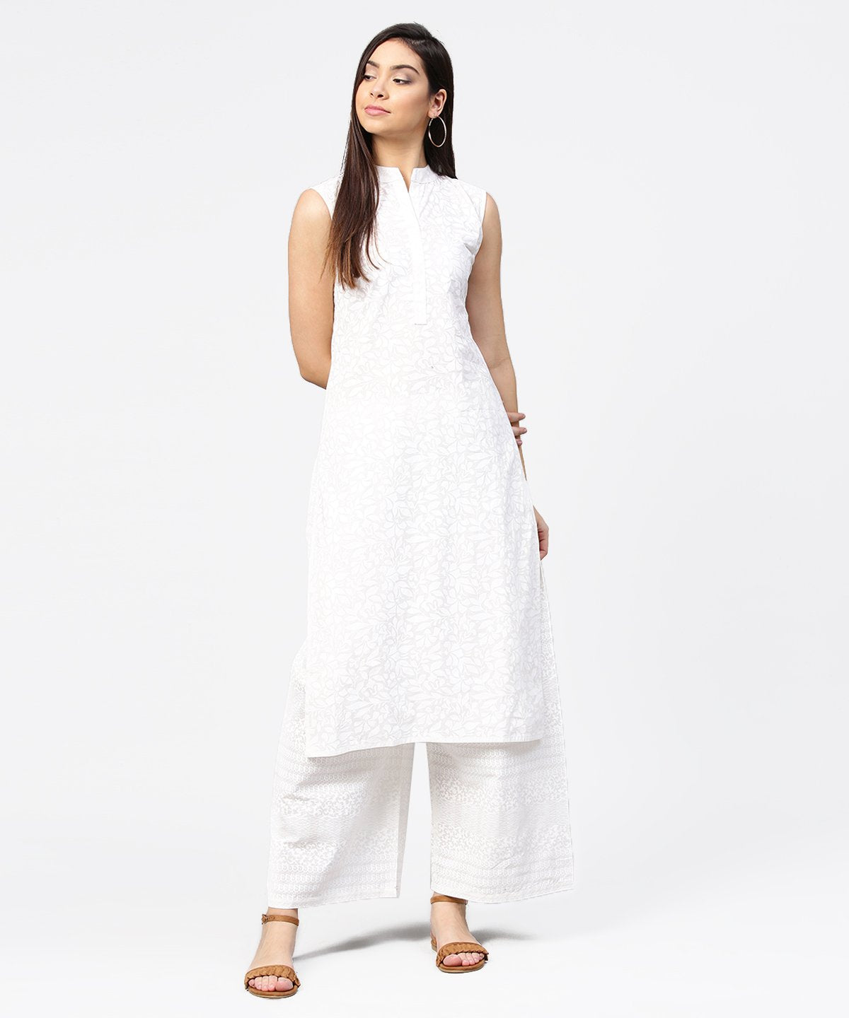 Off White Printed Sleeveless Cotton Kurta With Ankle Length Pallazo | LASVINI - Redefining Indian Fashion with Elegance