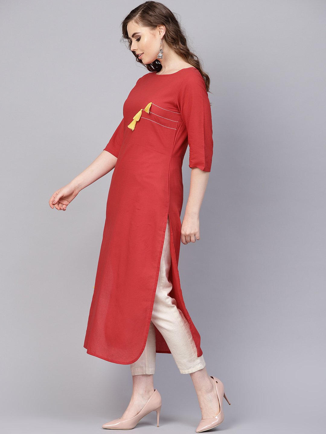 Solid Red Kurta With Thread Stitch And Tassels Detailing With A Round Neck And 3/4Th Sleeves | LASVINI - Redefining Indian Fashion with Elegance