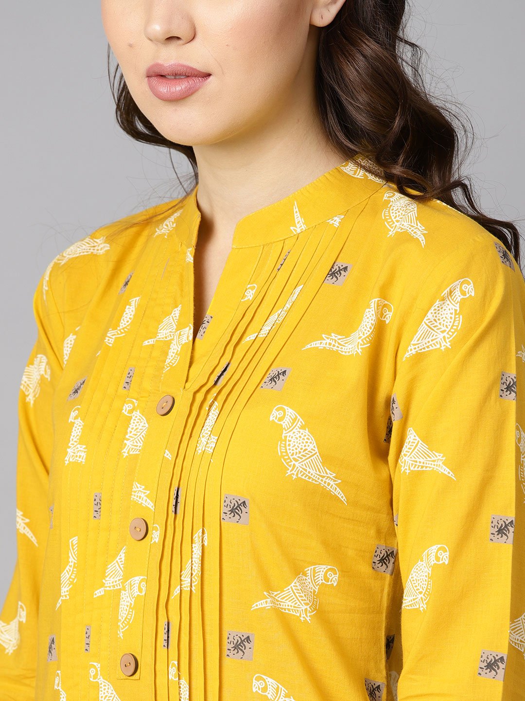 Mustard Yellow White Khadi Bird Print Kurta With Pleats Detailing | LASVINI - Redefining Indian Fashion with Elegance